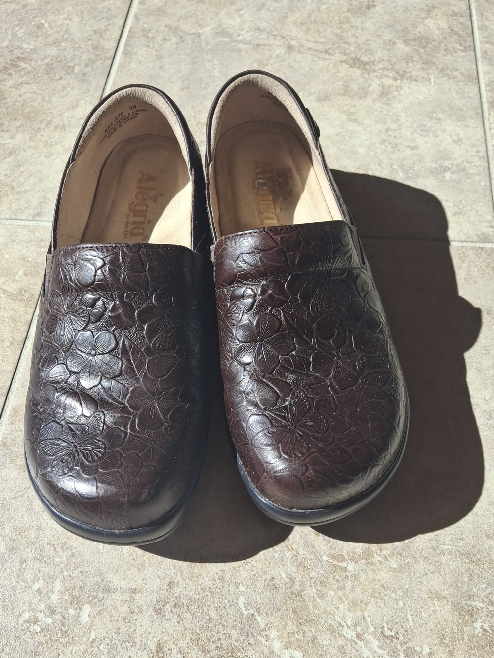 Alegria Women's Dark Brown Floral Embossed Slip-On Clogs